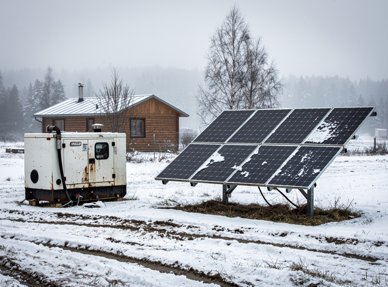 Solar array and backup generator at an off-grid property in winter